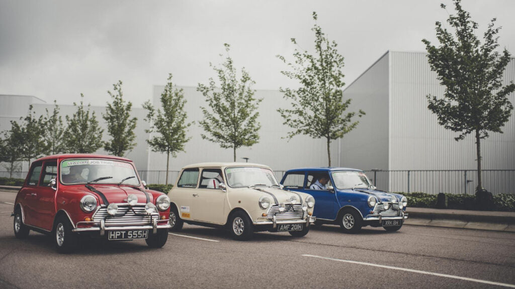 Three Minis from the iconic Italian Job line up as three famous movie cars.