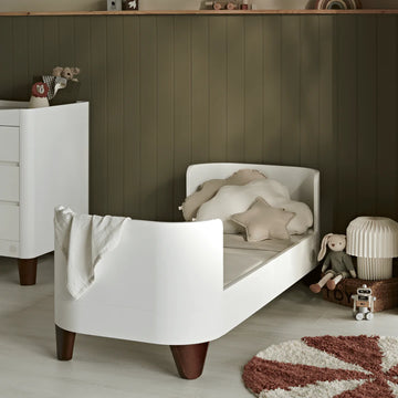 Gaia-Baby-Serena-Junior-Bed-Extension-Lifestyle-Walnut-Legs.png.webp__PID:a2dd41e2-2822-4165-bdc3-5a262f317d2f