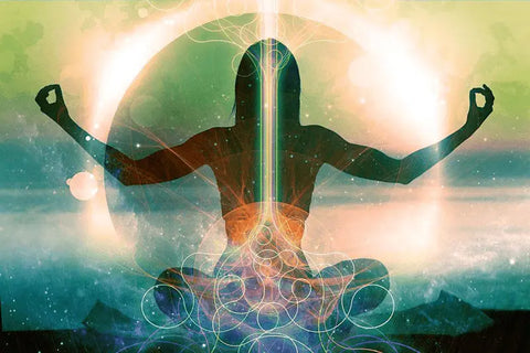 An artistic representation of a woman in meditation with a translucent silhouette layered over a serene landscape. Colorful, radiant energy centers, or chakras, are aligned along her body's midline, emanating a spectrum of light that signifies spiritual awakening. Circular patterns and beams of light surround her, implying a deep state of peace and connection with the universe.