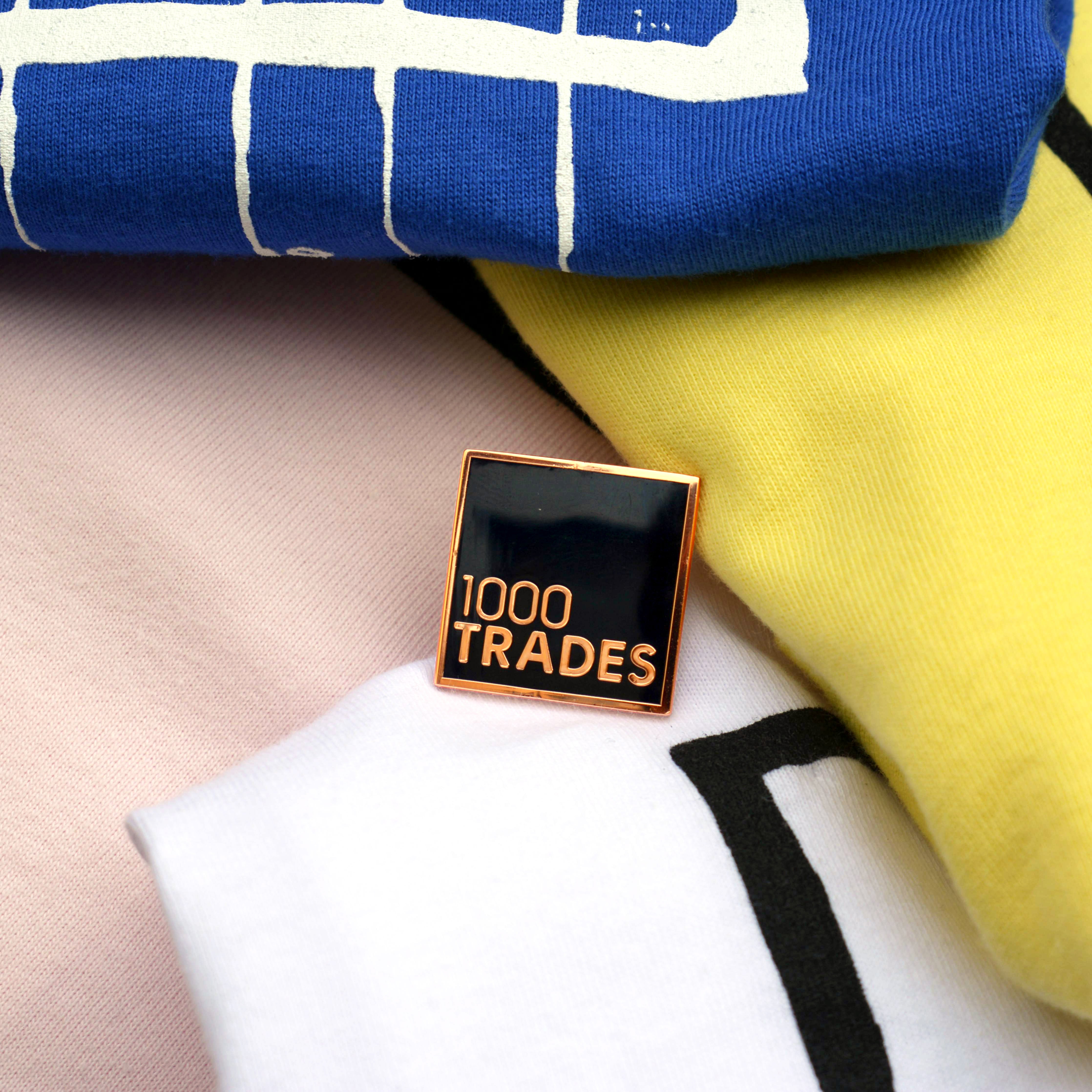 1000 Trades Pin Badge