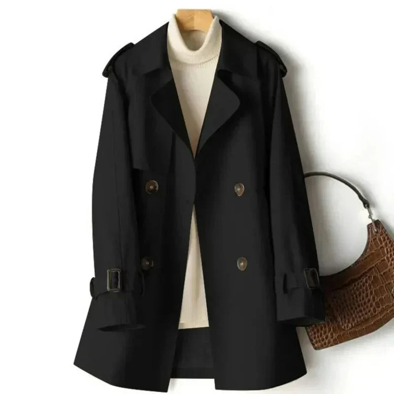 Elegant double-breasted trench coat showcasing shoulder epaulettes and button front