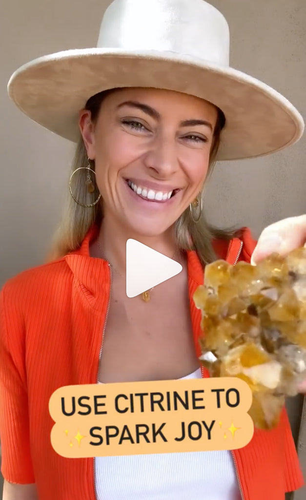 Woman in hat caption: Use citrine to spark joy