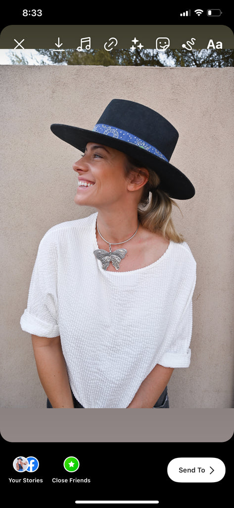 Woman in Hat Smiling