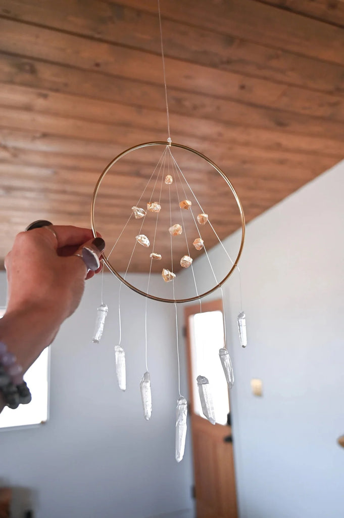 Citrine crystal suncatcher shown to depict positive mental health through bringing joy to your home.