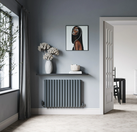 An image of a grey-themed hallway with a matching grey radiator