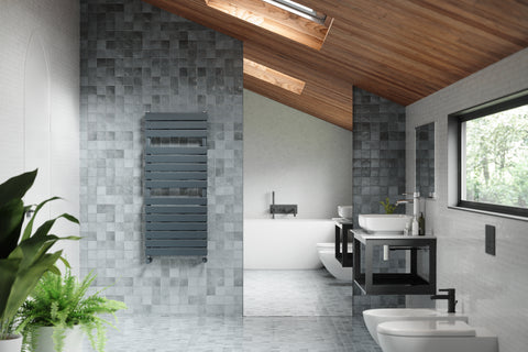An image of a grey bathroom with a darker grey radiator