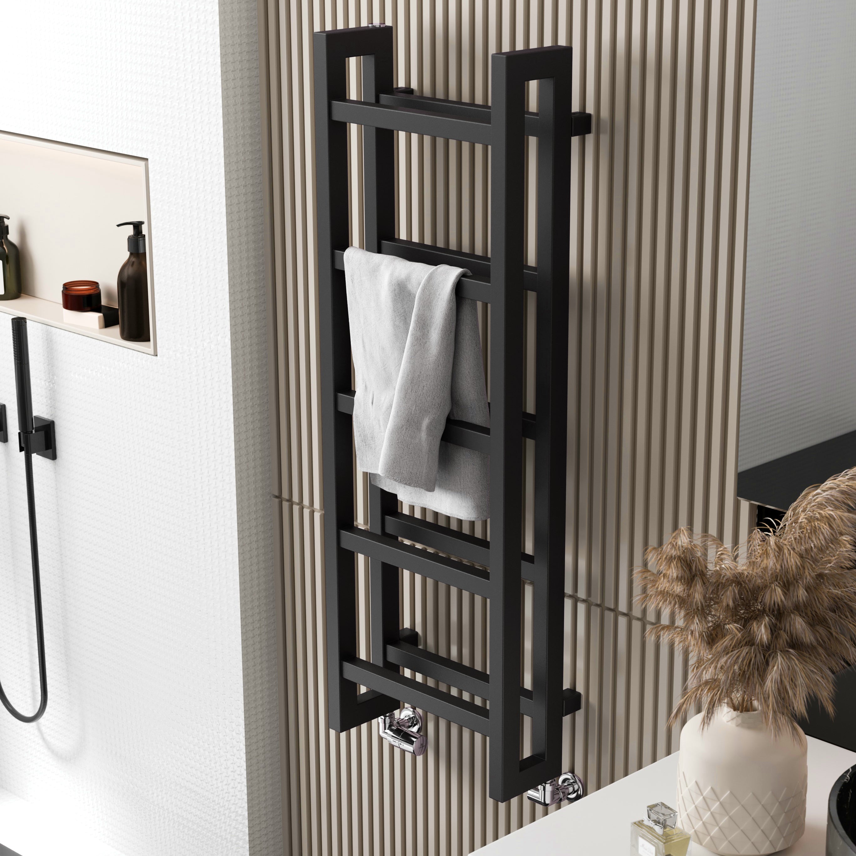 The Stand black towel rail resembles a minimalist ladder. It is shown mounted to a wood-panelled bathroom wall with a hand towel over one rung.