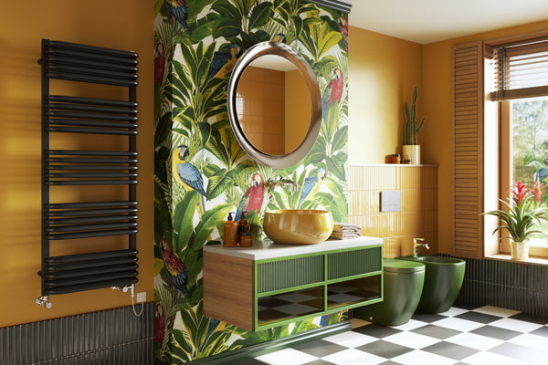 A bathroom with tropical wallpaper, yellow walls, and black and white tiling, featuring the black Crossmoor dual duel towel rail.