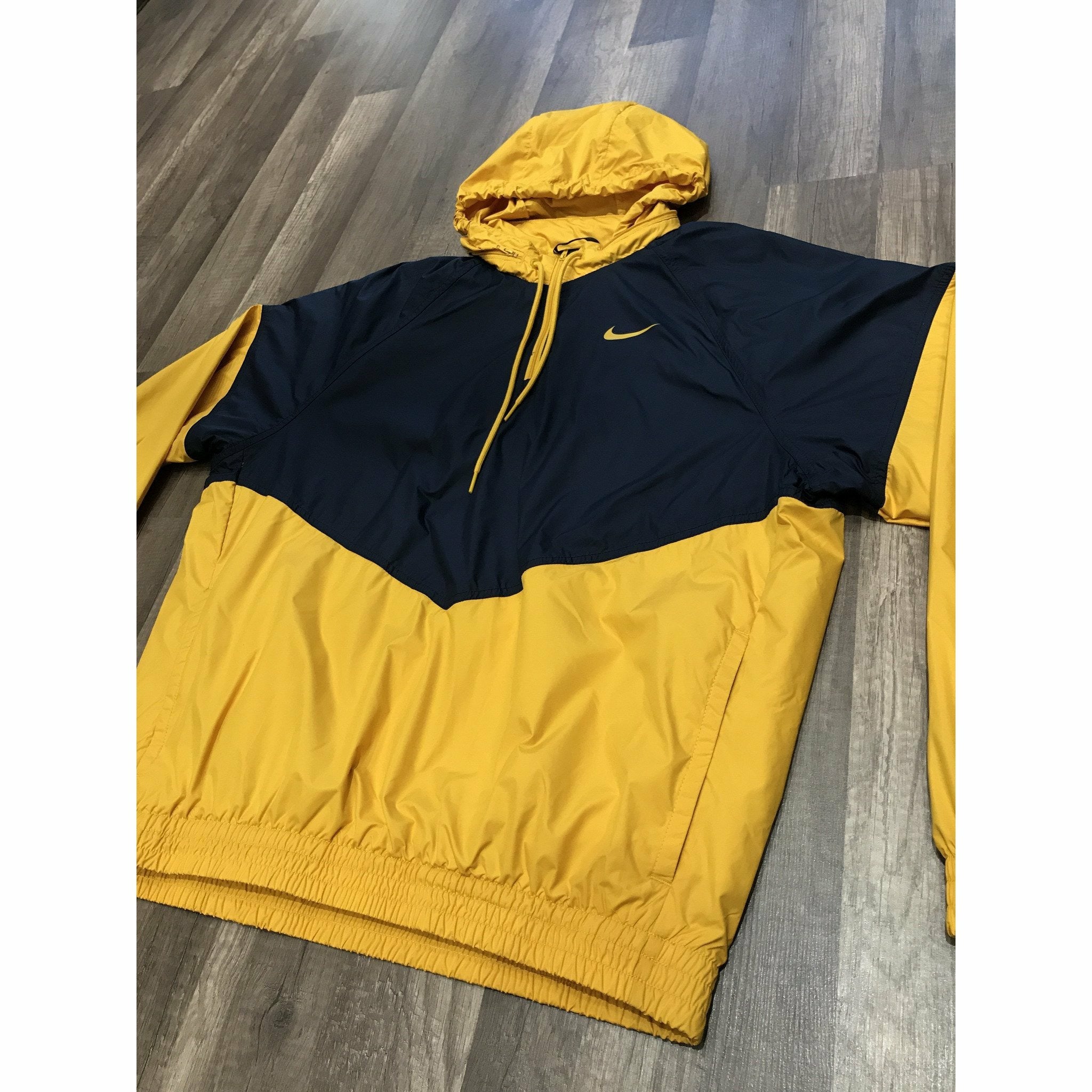 yellow nike windbreaker