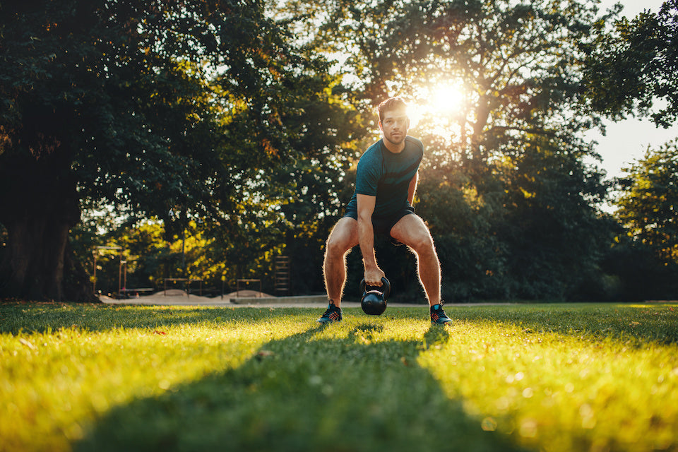 Athletic male gaining muscle while losing fat 