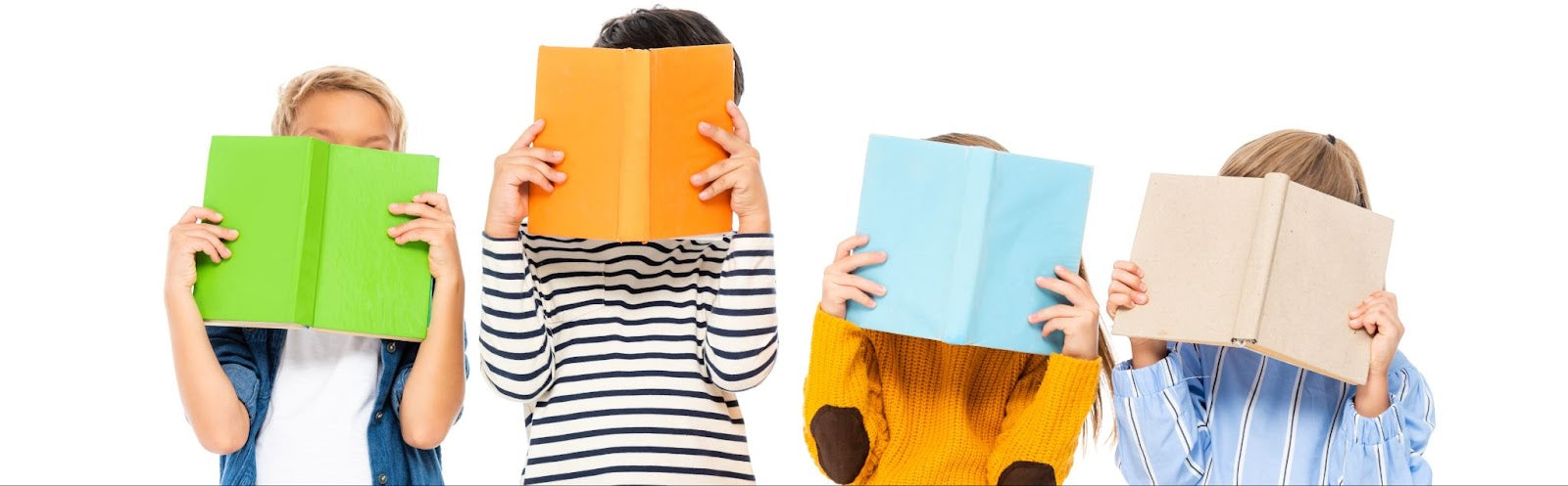 Four children peeking out from behind books, smiling