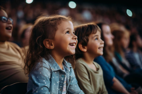Two kids enjoying a concert in the audience, part of a family playlist for musical bonding