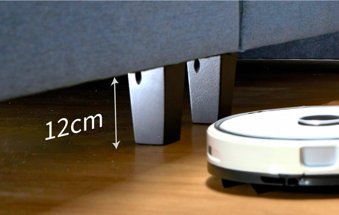 an-image-of-a-gap-between-the-bed-and-the-wooden-floor-with-the-measurement-of-12cm-and-a-robot-vacuum-cleaner-at-the-side.jpg__PID:56db8700-1352-4960-8018-0657a18b5080