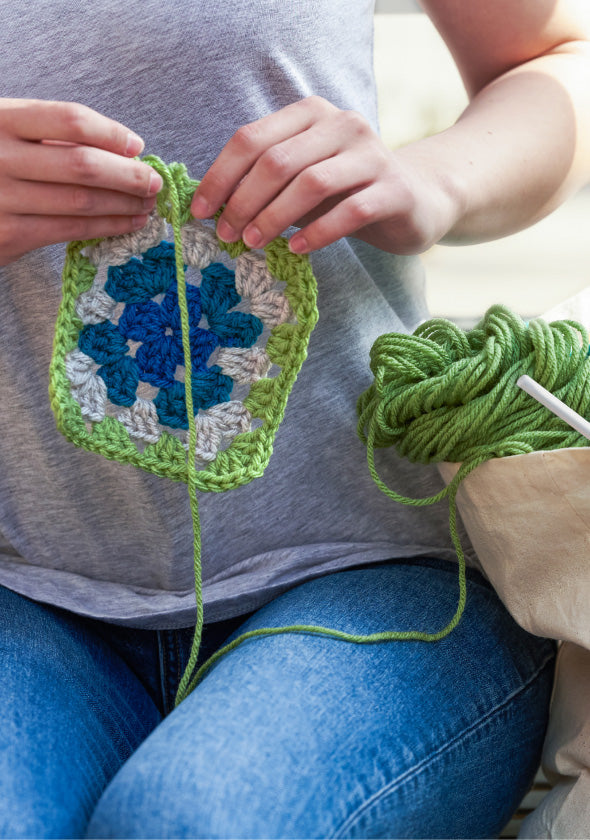 image of women knitting blanket