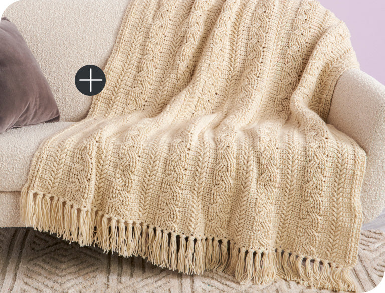 image of Caron Braided Cable Crochet Blanket