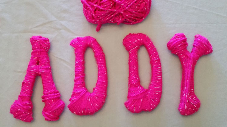 Addy letters wrapped in Reflective yarn