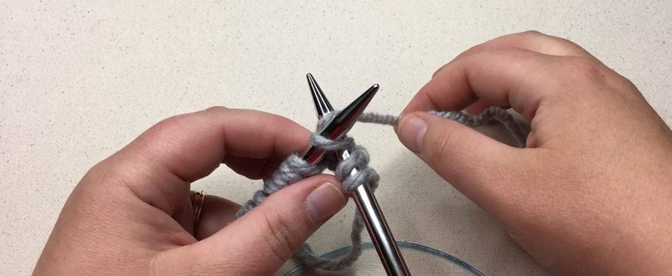 Seaming the knitted squares together