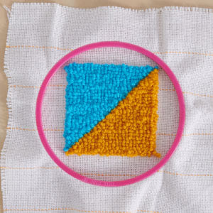 Step 4: Ring on cloth with designs Front