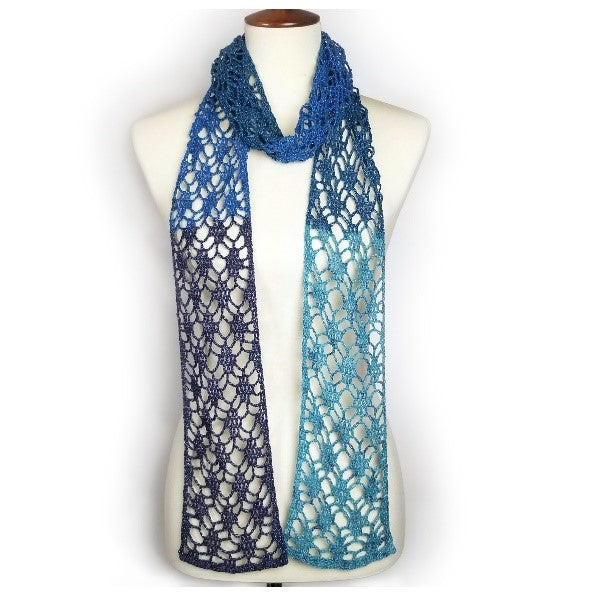 Red Heart One Skein Diamond Lace Scarf in dark blue, royal blue and sky blue contrast is wrapped around mannequin neck