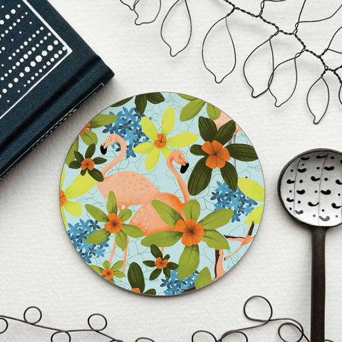 circular coaster with flamingoes and tropical florals