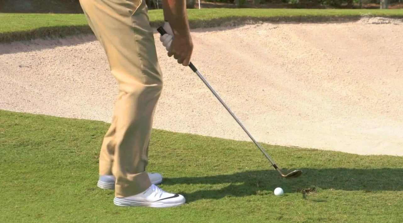 write a blog about How to hit a flop shot over a bunker