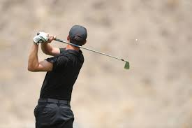 Write a blog about the The Role of the Follow-Through in a Proper Golf Swing