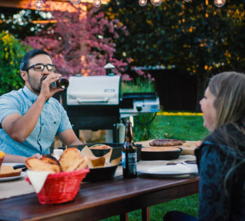 pellet smoker in background