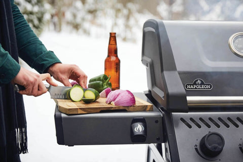 bbq being used with chopping board