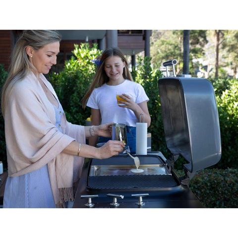 women cooking with bbq