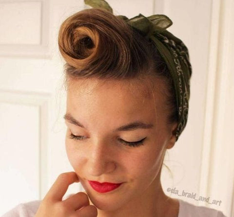 Vintage-Inspired Victory Rolls hairstyle