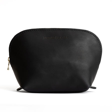 Black*Bella | Leather makeup bag with curved top zipper and flat bottom