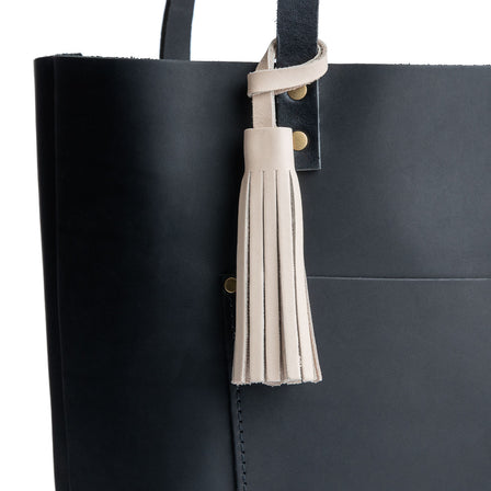 All Color: Bone | Fringed leather tassel with leather loop