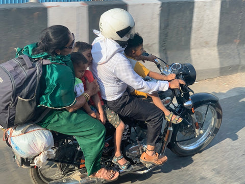 Motorcycle carrying family of four near Agra