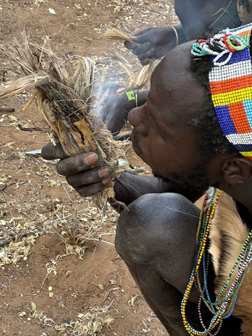 Hadzabe making fire near Lake Eyasi, Tanzania