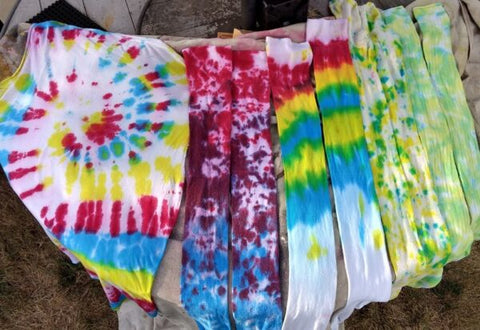 Finished tie dyed items laid flat