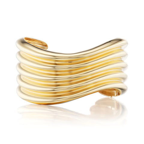 Dramatic 5-tier yellow gold wave cuff with hinge opening.