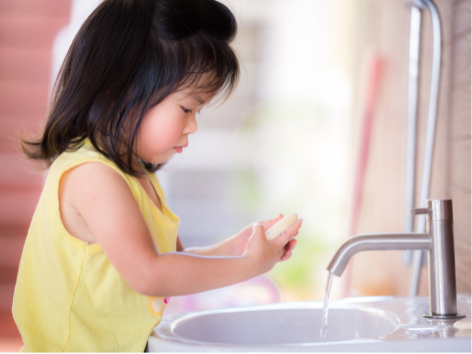 Child using soap