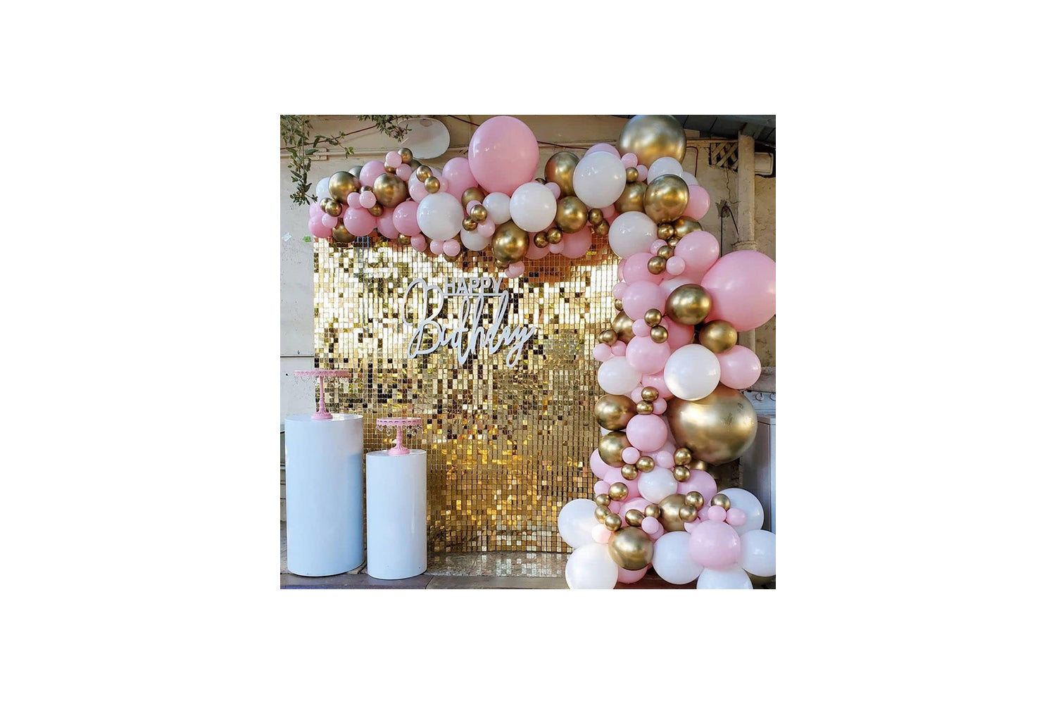 pink and gold party balloon arch