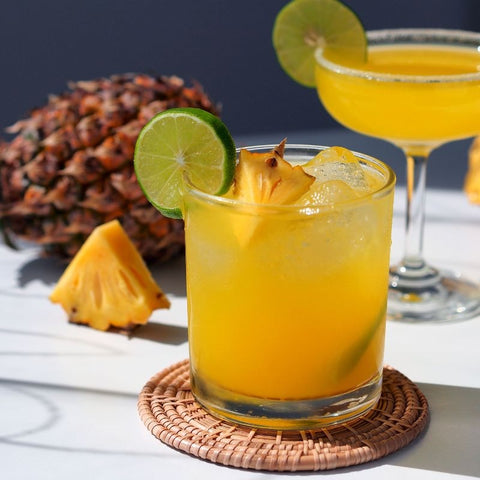 A refreshing Pineapple Paloma recipe with vibrant colors and tropical flavors perfect for summer gatherings.