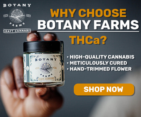 A hand holding a jar of Botany Farms THCa Flower