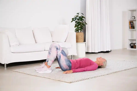 Woman doing pelvic floor exercise for more longevity - starting position