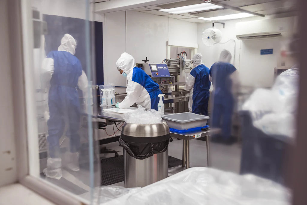 Technicians working in ISO-certified cleanroom at Polysciences