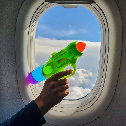 a squirt gun on an airplane
