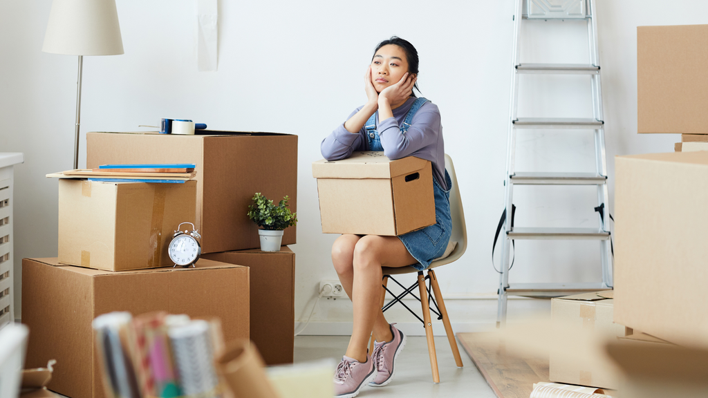 girl contemplating how to declutter and organize her home