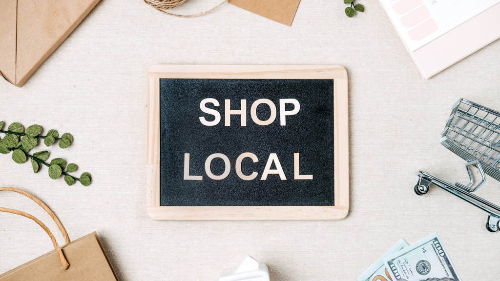 shop local words on small black board