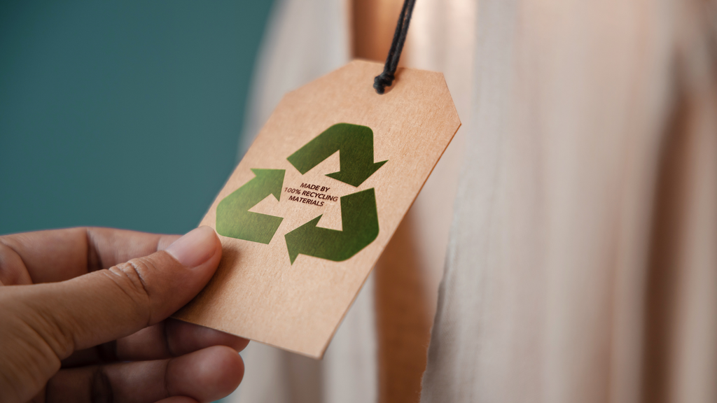 clothing tag with tag indicating item is made from recycled material