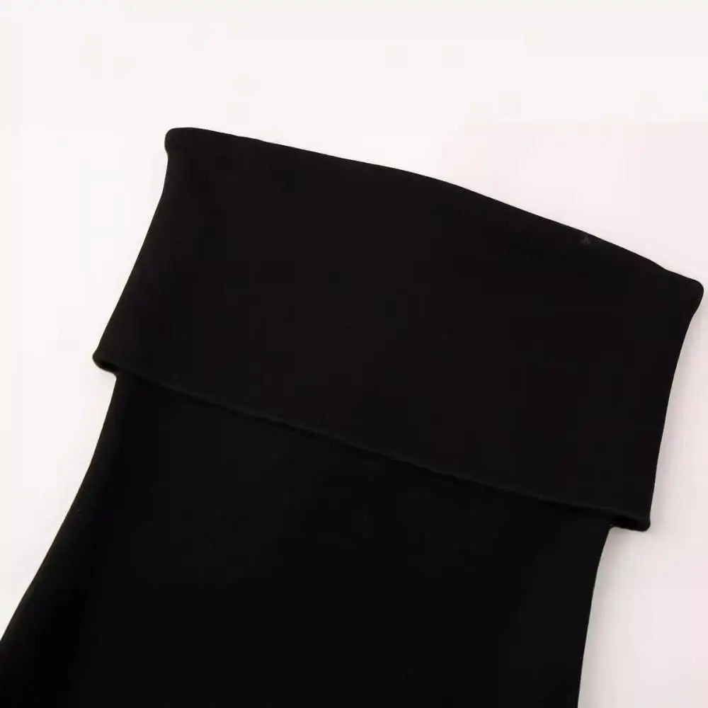 Solid knit open-shoulder midi dress for elegant evening wear.