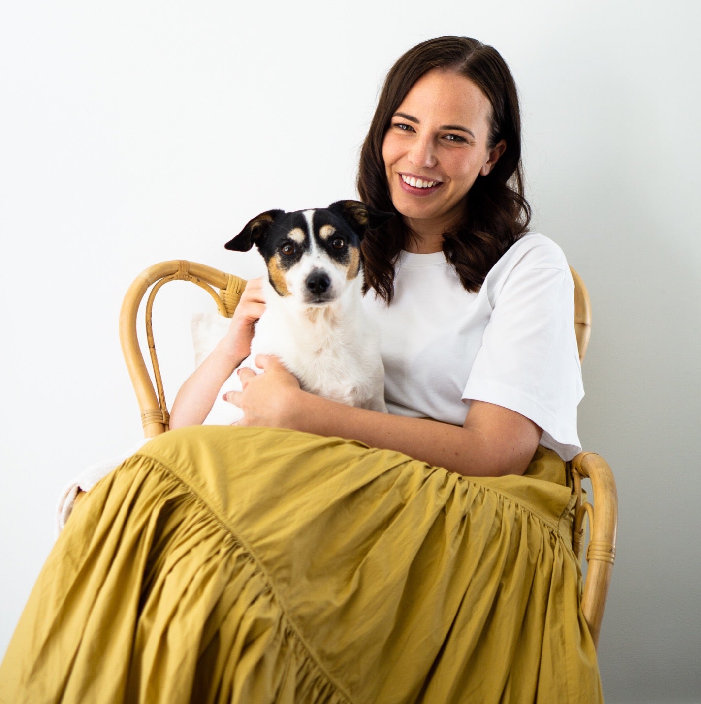 A photo of Serena Walker and her terrier dog