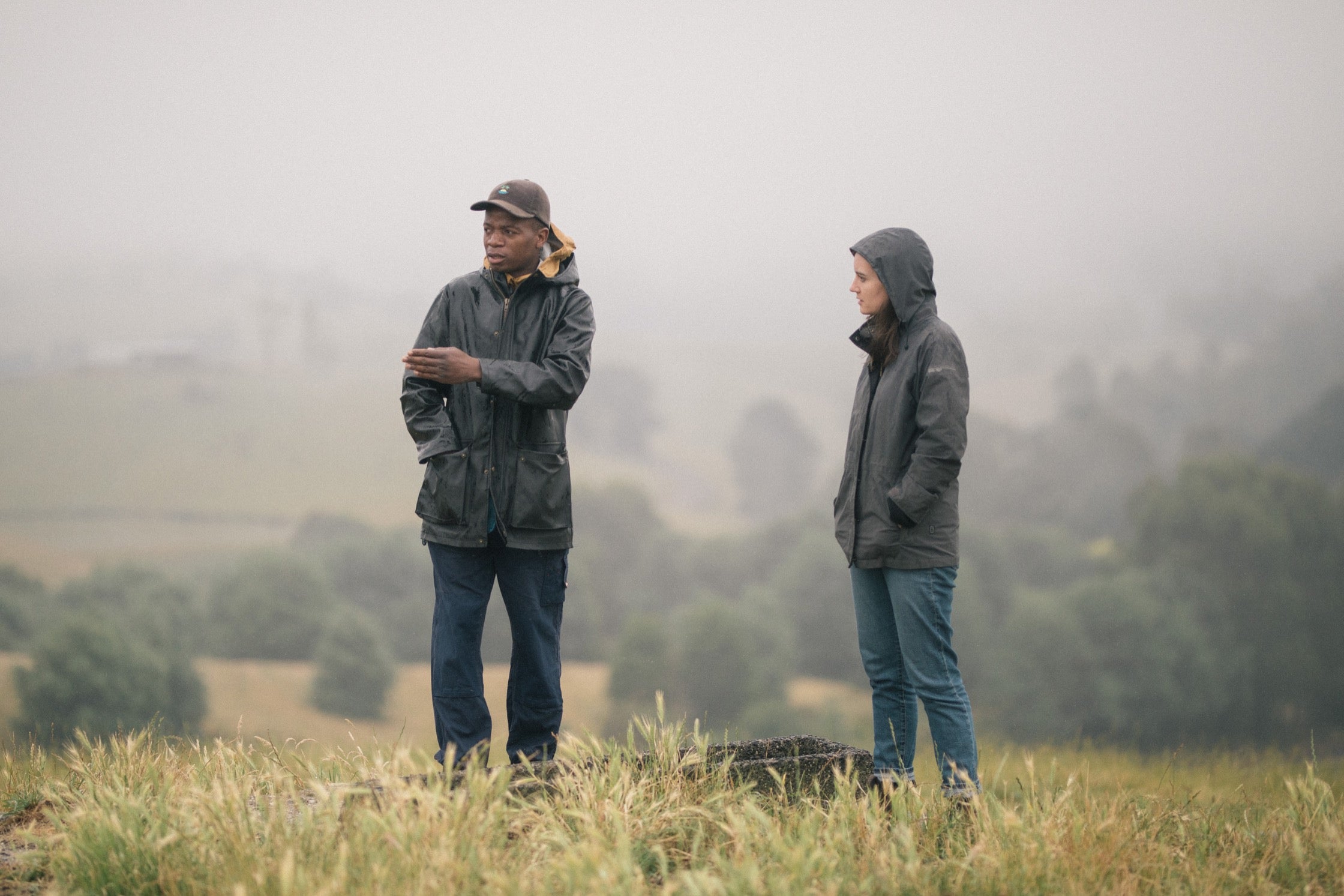 Nez and Ruby converse in a foggy field.