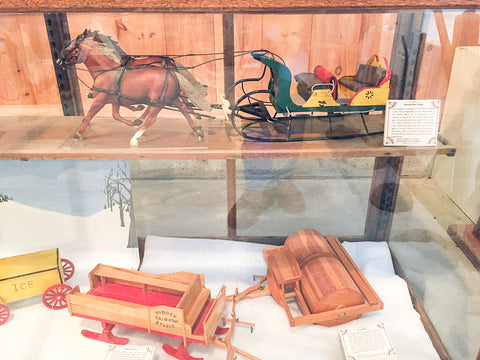 Triple Mountain Breyer sleighs and winter vehicles in the model horse and carriage exhibit at Skyline Farm